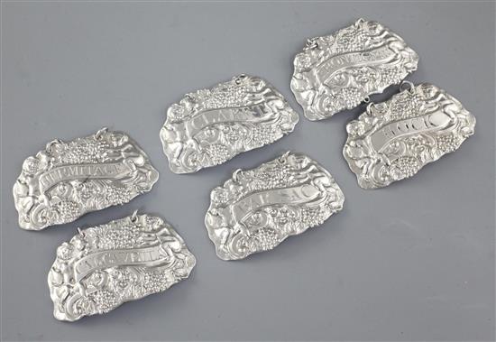 A rare set of six Irish George III silver wine labels, by John Townsend?, Width of each 60mm Total weight: 2.1oz/68grms